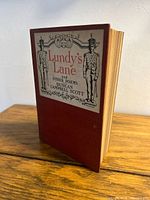 Front cover showing title label and red cloth