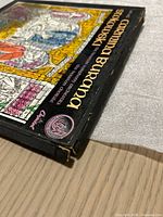 Box spine showing title and pink stereo emblem