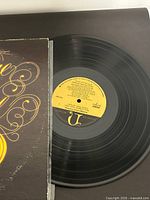 Vinyl record on turntable displaying label