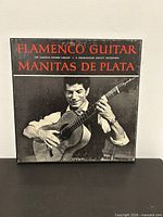 Front album cover showing title and artist