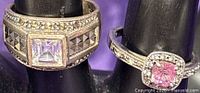 Close-up of both rings showing stones and marcasite detailing