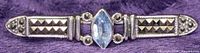 Front view of brooch showing blue topaz and marcasite layout