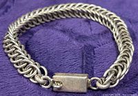 Full view of braided sterling bracelet showing clasp