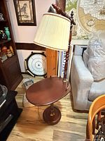 Full view of lamp with attached table and shade