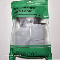 Front of sealed green pouch showing contents and product labeling