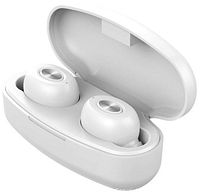 White earbuds seated in open charging case
