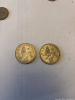 Reverse side showing crowned lion designs and denominations