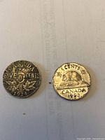 Obverse sides of 1924 and 1953 Canadian nickel coins