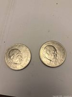 Two obverse sides showing Churchill busts