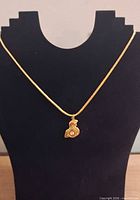 Full view of necklace on display bust