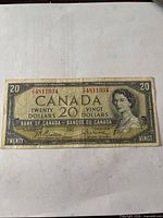 Front of 1954 $20 Devil's Face note showing portrait, denomination and serial number