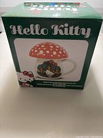 Front of retail box showing mug image and branding