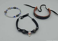 Overview of the three bracelets laid out