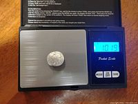 Nugget on scale showing 10.19 g reading