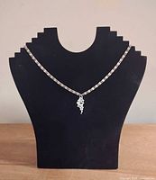 Necklace displayed on bust showing overall length and pendant placement