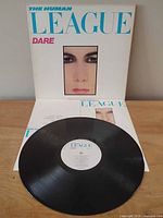 Front sleeve upright behind record and inner sleeve