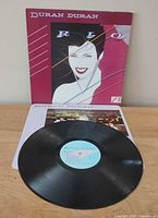 Front sleeve showing Patrick Nagel artwork, record and inner sleeve