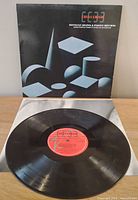 Front sleeve with record partially shown