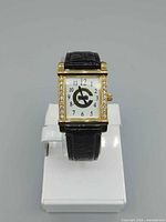 Front view of watch showing dial, bezel, strap