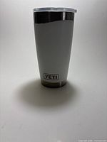 Full view of tumbler front showing logo and overall condition