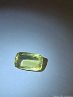 Top view of lemon citrine showing cushion cut and color