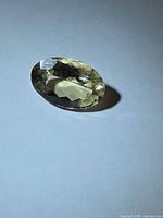 Top view of oval golden Helidor gemstone