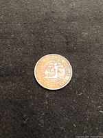 Reverse side showing Prince Edward Island crest and denomination