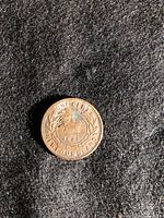 Front of 1896 Newfoundland one cent coin showing crown, wreath, denomination, date