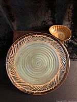 Top view of platter and bowl showing design, glazing, relative size