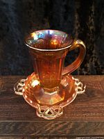 Cup placed inside bowl showing color and form