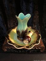 Group shot of bowl with tall vase inside and small vase showing base mark