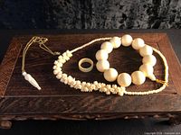 Full set showing pendant, ring, necklace and bracelet