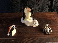 Front view of trinket box and both brooches