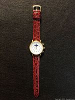 Front view of wristwatch showing dial, strap, case