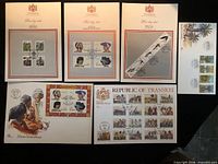 Group view of six first-day sheets and covers