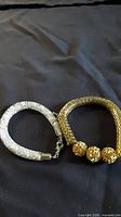 Gold and silver Swarovski mesh bracelets side by side