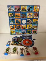 Full set showing board, spinner disk, hub and five character standees with stands