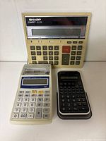 All three calculators front view