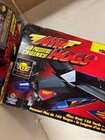 Front of boxed Air Hogs Air Pressure Engines plane