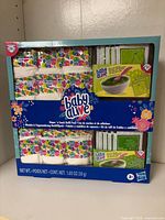 Front view of sealed Baby Alive Diaper 'n Snack Refill Pack box