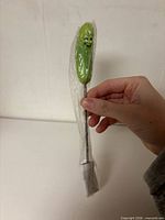Full view of packaged pickle fork