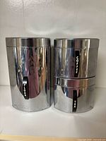 front view showing flour, coffee, and tea canisters together