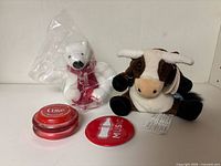 Overall lot showing two plush toys, yo-yo and red MUSIC disc