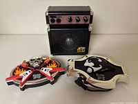 front view of amplifier and both belt buckles