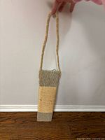 Front view showing full length scratcher with rope hanger
