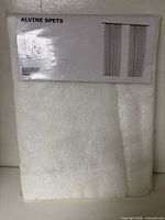 Front of sealed IKEA Alvine Spets curtain package
