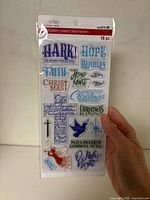 Front of sealed Recollections clear stamp package showing all 18 stamp designs