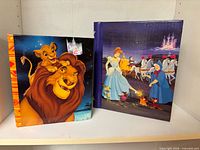 Both Disney photo albums front covers