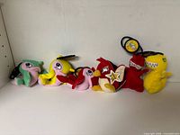 Row of six Neopets plush keychains