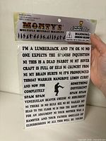 Front of sealed package showing Monty’s Multiple Message Magnets sheet with Monty Python phrases